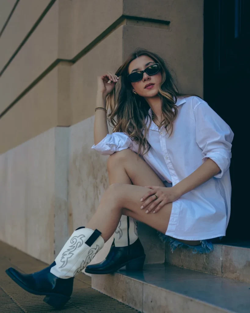 Country Christmas party outfit ideas with cowboy boots and modern western styling