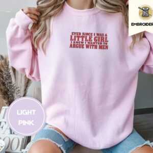 Person wearing a light pink Argue With Men Embroidered Sweatshirt
