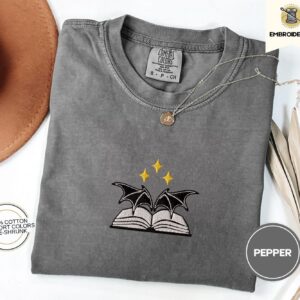 Pepper Bat Wings and Book Embroidered T-Shirt