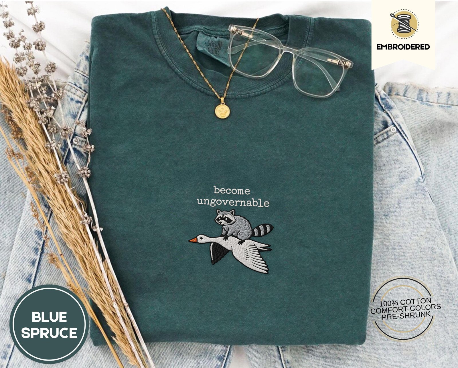 Blue Spruce Become Ungovernable Raccoon Goose Embroidered T-Shirt