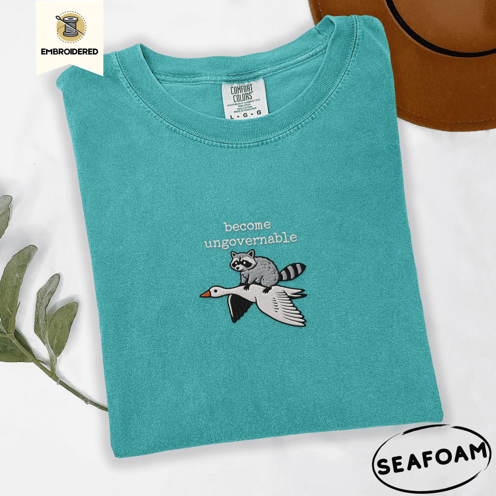 Seafoam Become Ungovernable Raccoon Goose Embroidered T-Shirt