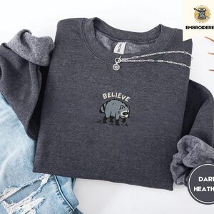 Dark Heather Believe Raccoon Embroidered Sweatshirt