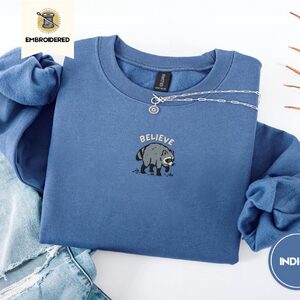 Indigo Blue Believe Raccoon Embroidered Sweatshirt