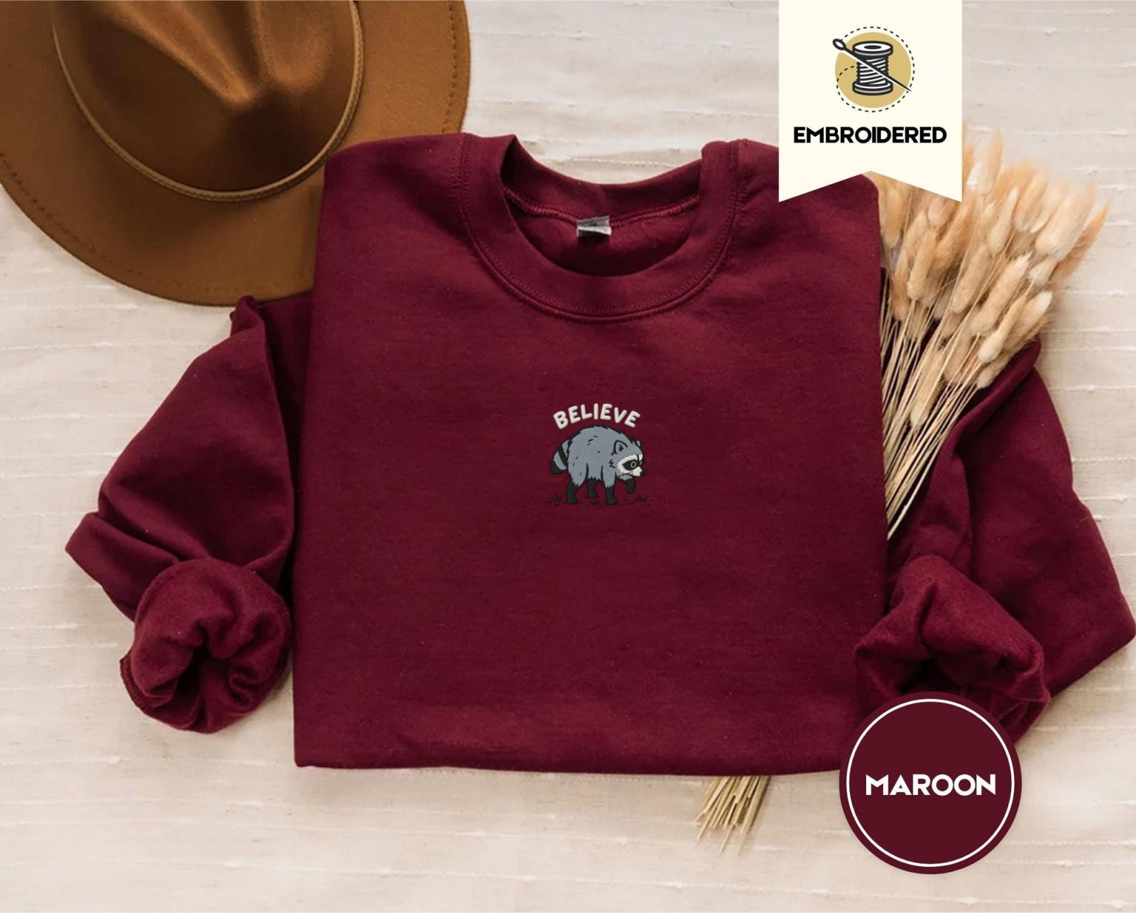 Maroon Believe Raccoon Embroidered Sweatshirt
