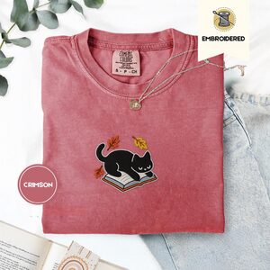 Crimson Black Cat on Book Embroidered T-Shirt