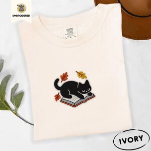 Ivory Black Cat on Book Embroidered T-Shirt