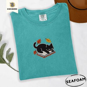 Seafoam Black Cat on Book Embroidered T-Shirt