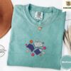 Seafoam Books and Flowers Embroidered T-Shirt