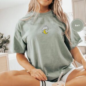 Person wearing a bay Bunny Over Crescent Moon Embroidered T-Shirt