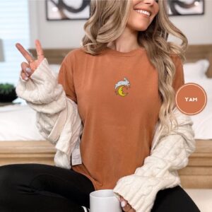 Person wearing the Bunny Over Crescent Moon Embroidered T-Shirt