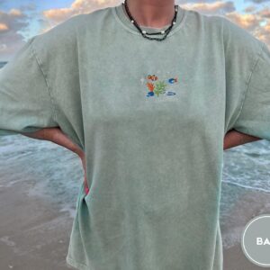 Person wearing a bay Coral Reef Fish Embroidered T-Shirt