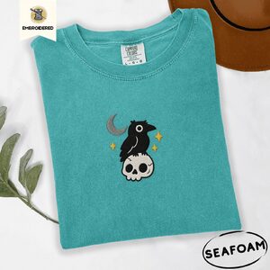 Seafoam Crescent Moon Crow and Skull Embroidered T-Shirt