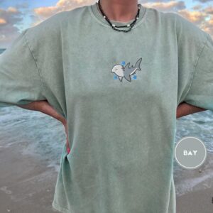 Person wearing a bay Cute Hammerhead Shark Embroidered T-Shirt