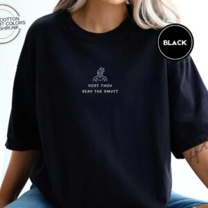 Person wearing a black Dost Thou Read The Smut Embroidered T-Shirt