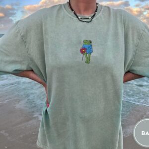 Person wearing a bay Flower Frog Embroidered T-Shirt