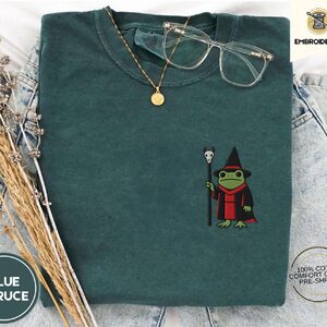 Blue Spruce Frog and Skull Staff Embroidered T-Shirt