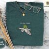 Blue Spruce Frog Riding Goose Embroidered T-Shirt