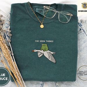 Blue Spruce Frog Riding Goose Embroidered T-Shirt