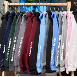 Gildan 18500 hoodies in every color on a clothing rack, each labeled with its color name