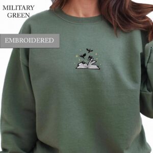 Person wearing a military green Gold Sparkle Dragons Embroidered Sweatshirt