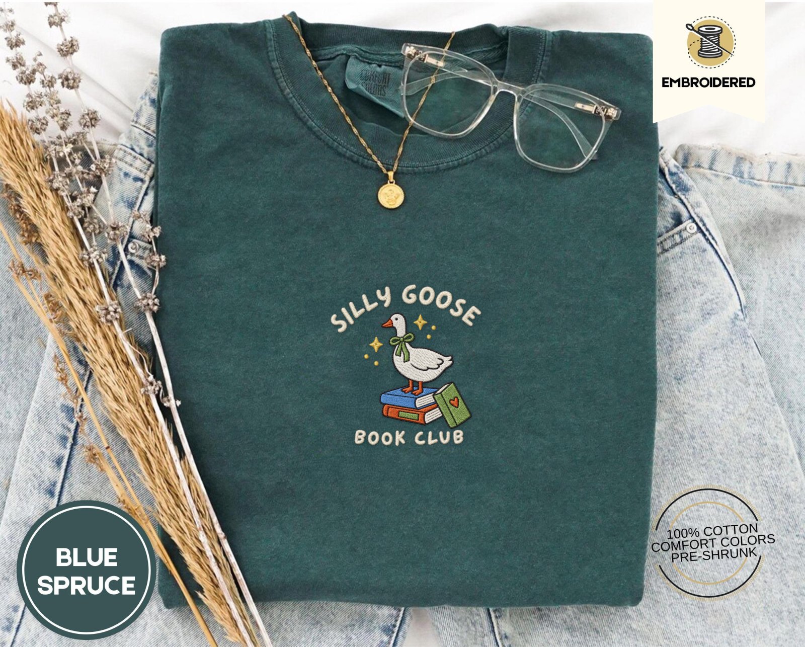 Blue Spruce Goose on Colorful Books Embroidered T-Shirt