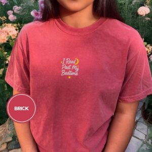 Person wearing a brick I Read Past My Bedtime Embroidered T-Shirt