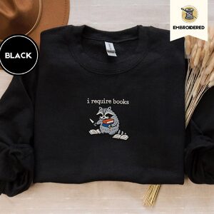 Black I Require Books Raccoon Embroidered Sweatshirt