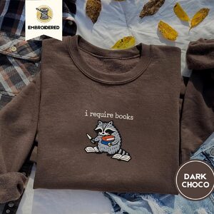 Dark Chocolate I Require Books Raccoon Embroidered Sweatshirt