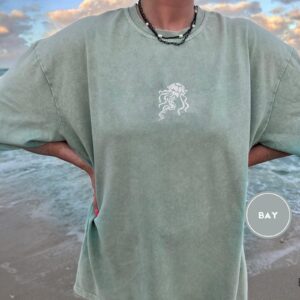 Person wearing a bay Jellyfish Embroidered T-Shirt