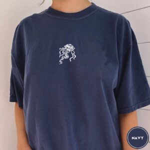 Person wearing a navy Jellyfish Embroidered T-Shirt