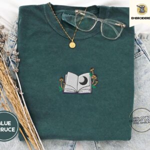 Blue Spruce Moon and Mushroom Book Embroidered T-Shirt