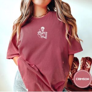 Person wearing a crimson Mount Hood Oregon Embroidered T-Shirt