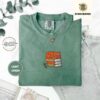 Light Green Orange Cat on Books Embroidered T-Shirt