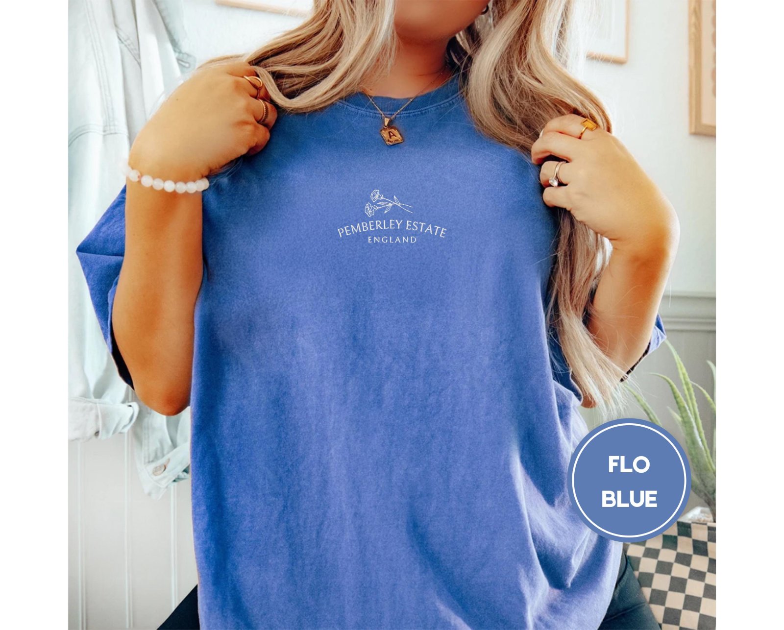 Person wearing a flo blue Pemberley Estate Floral Embroidered T-Shirt