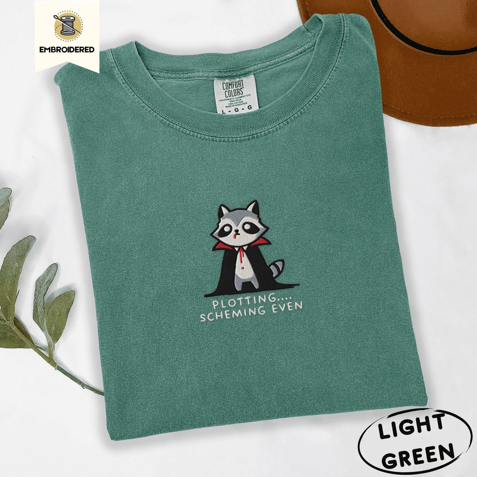 Light Green Plotting Scheming Vampire Raccoon Embroidered T-Shirt