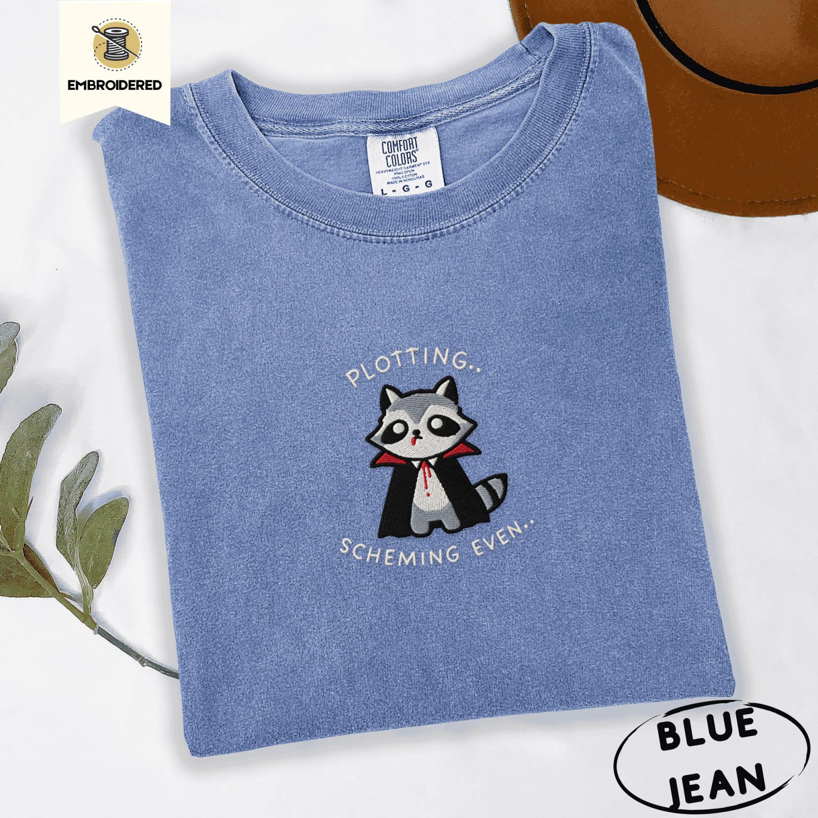 Blue Jean Plotting Vampire Raccoon Embroidered T-Shirt