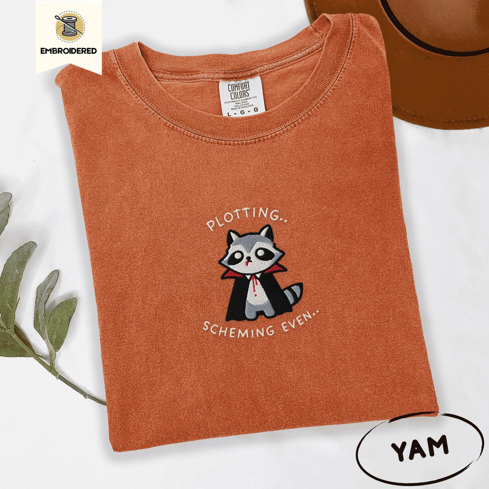 Yam Plotting Vampire Raccoon Embroidered T-Shirt