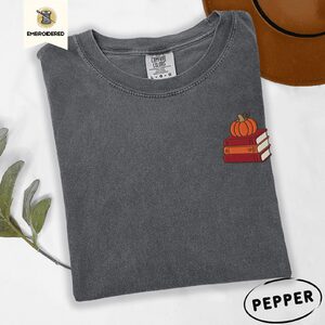 Pepper Pumpkin Book Stack Embroidered T-Shirt