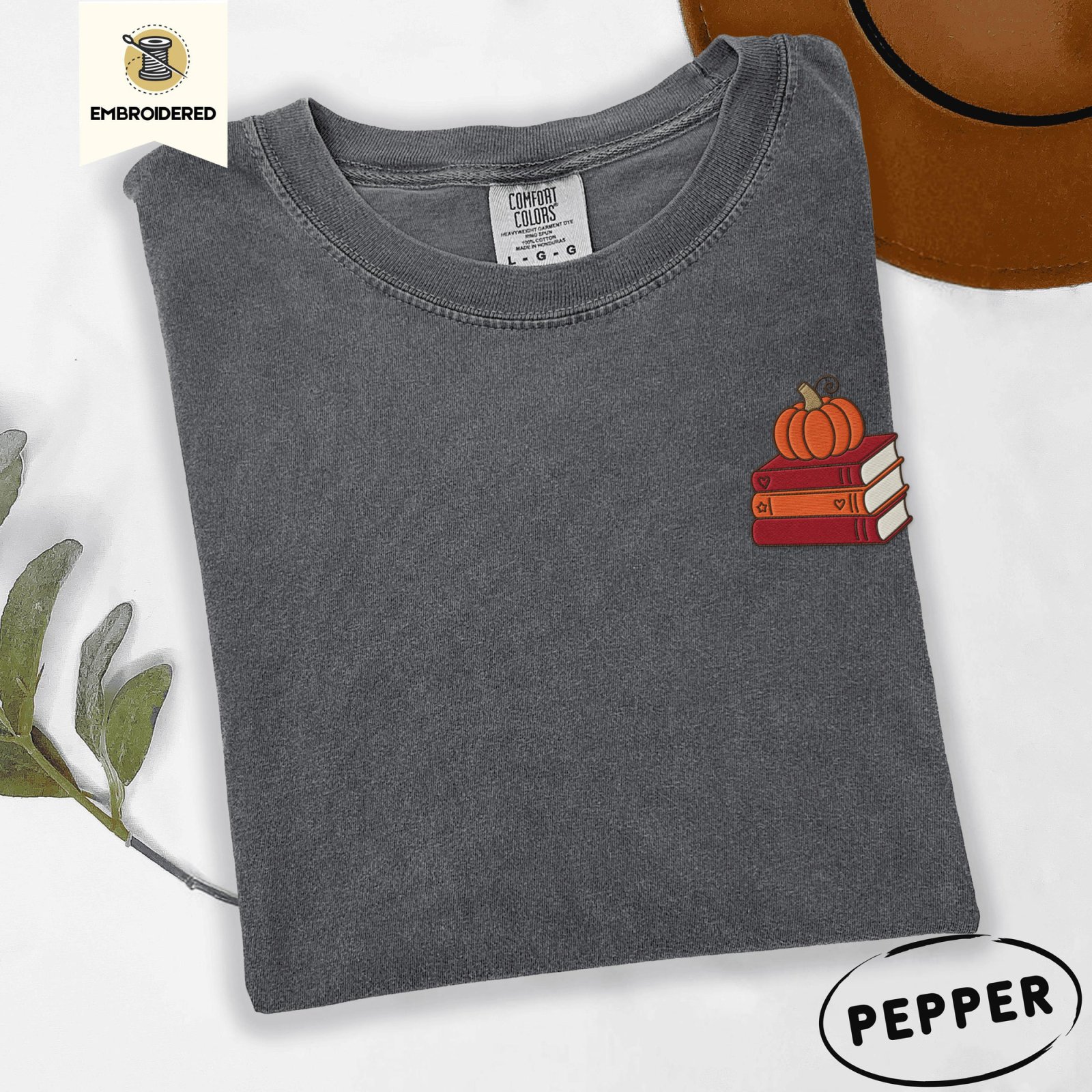 Pepper Pumpkin Book Stack Embroidered T-Shirt