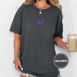 Person wearing a graphite Purple Butterfly Embroidered T-Shirt