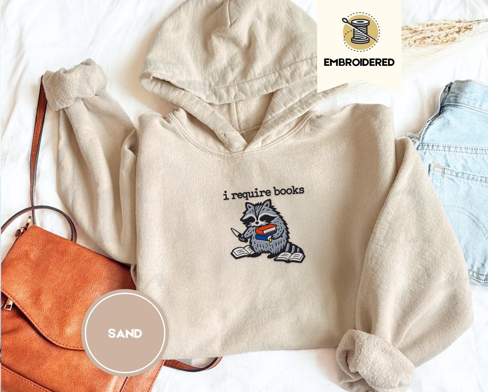 Sand Raccoon and Open Books Embroidered Hoodie