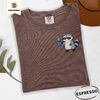 Espresso Raccoon Holding Blue Coffee Mug Embroidered T-Shirt