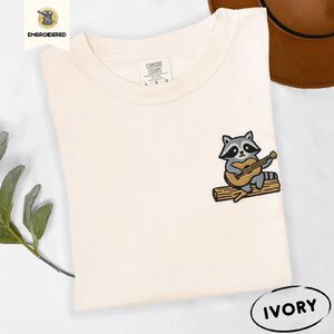 Ivory Raccoon Playing Guitar Embroidered T-Shirt