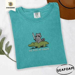 Seafoam Raccoon Riding Alligator Embroidered T-Shirt
