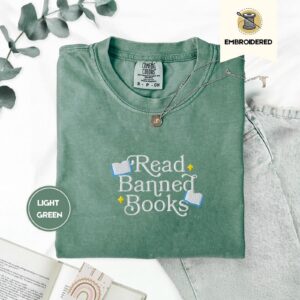 Flat lay of the Read Banned Books Embroidered T-Shirt