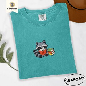 Seafoam Reading Raccoon Embroidered T-Shirt