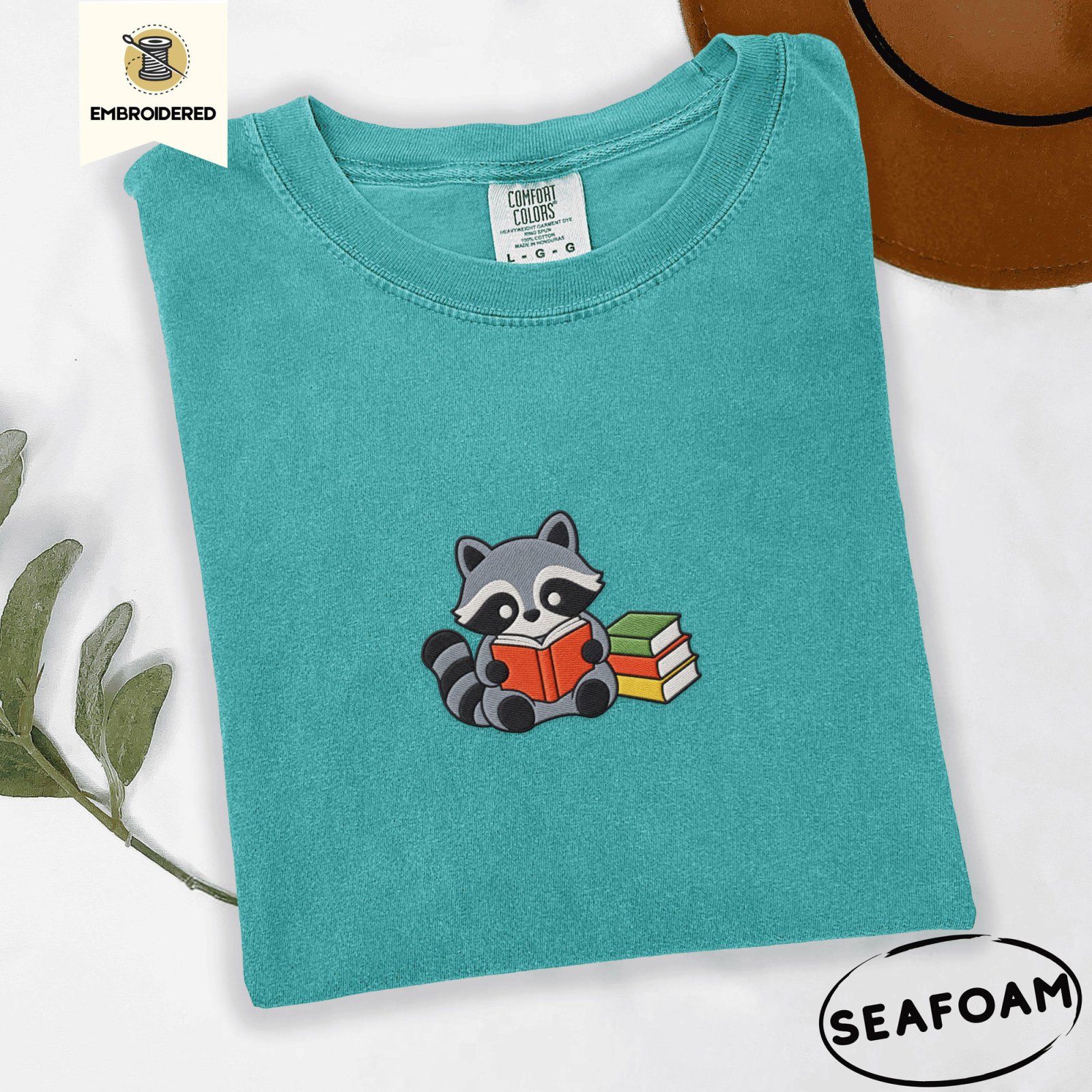 Seafoam Reading Raccoon Embroidered T-Shirt