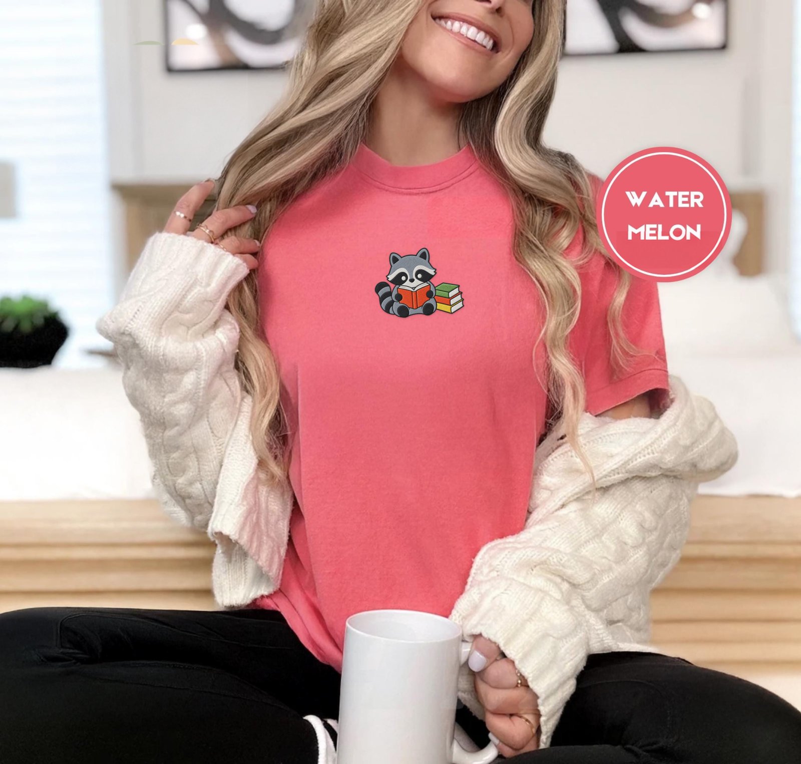 Person wearing a watermelon Reading Raccoon Embroidered T-Shirt
