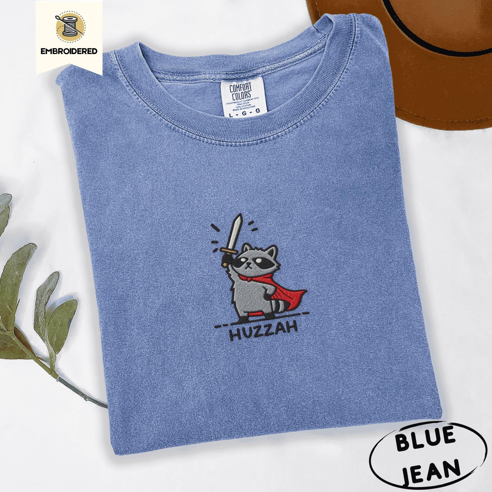 Blue Jean Red Cape Raccoon Sword Embroidered T-Shirt