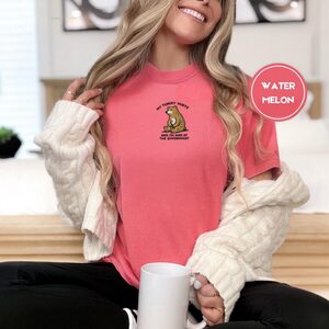 Person wearing a watermelon Seated Golden Bear Embroidered T-Shirt